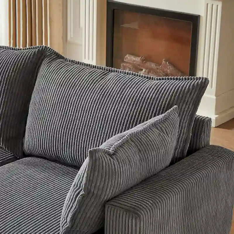 Canapé modulaire convertible en velours côtelé avec assises de rangement et deux poufs amovibles, offrant des combinaisons flexibles.
