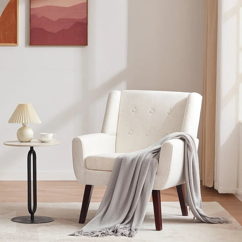Ensemble de deux fauteuils capitonnés modernes