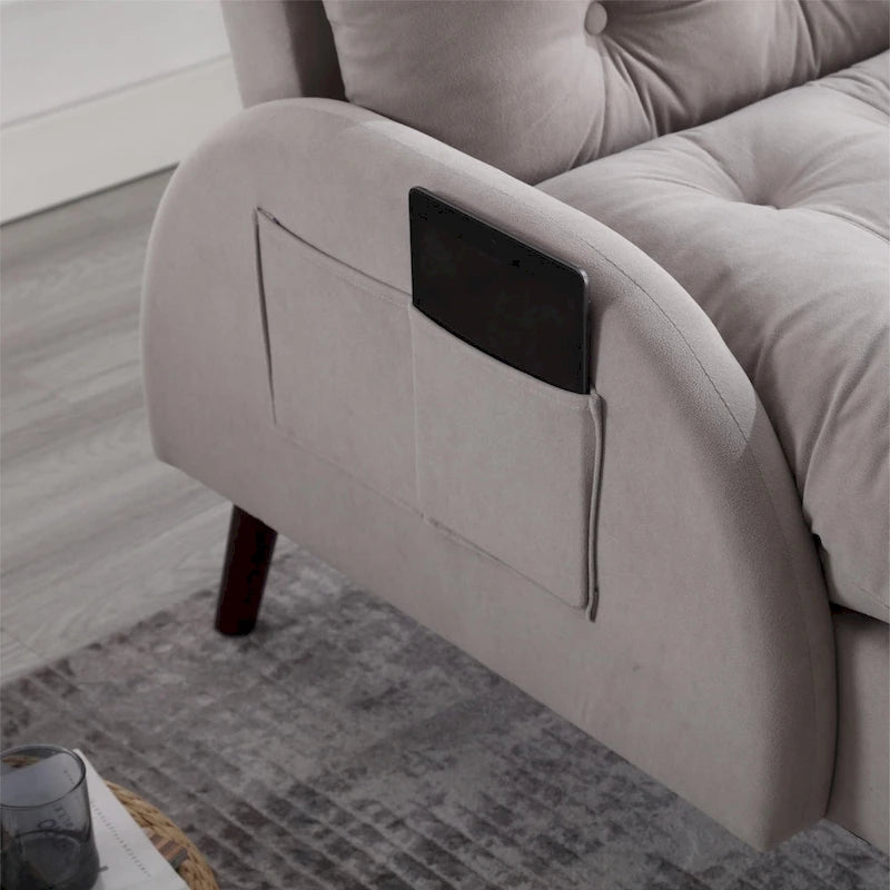 Un fauteuil inclinable rembourré avec dossier réglable et un repose-pieds de rangement.