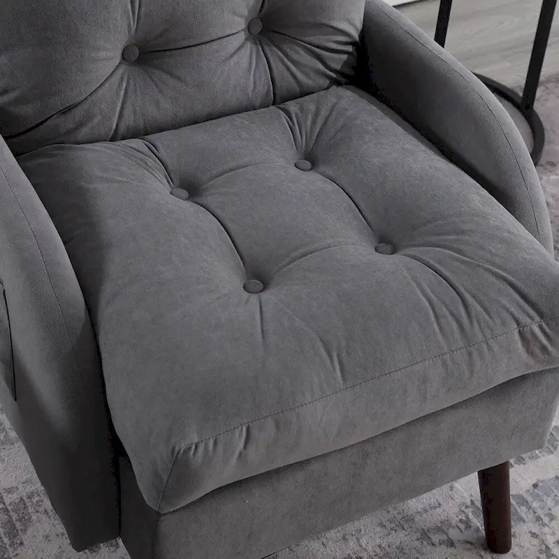 Un fauteuil inclinable rembourré avec dossier réglable et un repose-pieds de rangement.