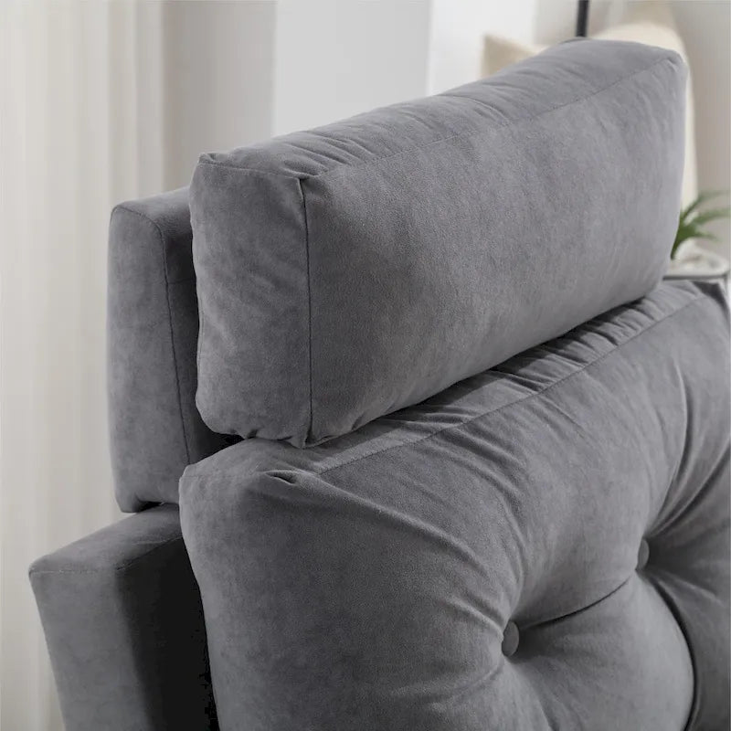 Un fauteuil inclinable rembourré avec dossier réglable et un repose-pieds de rangement.