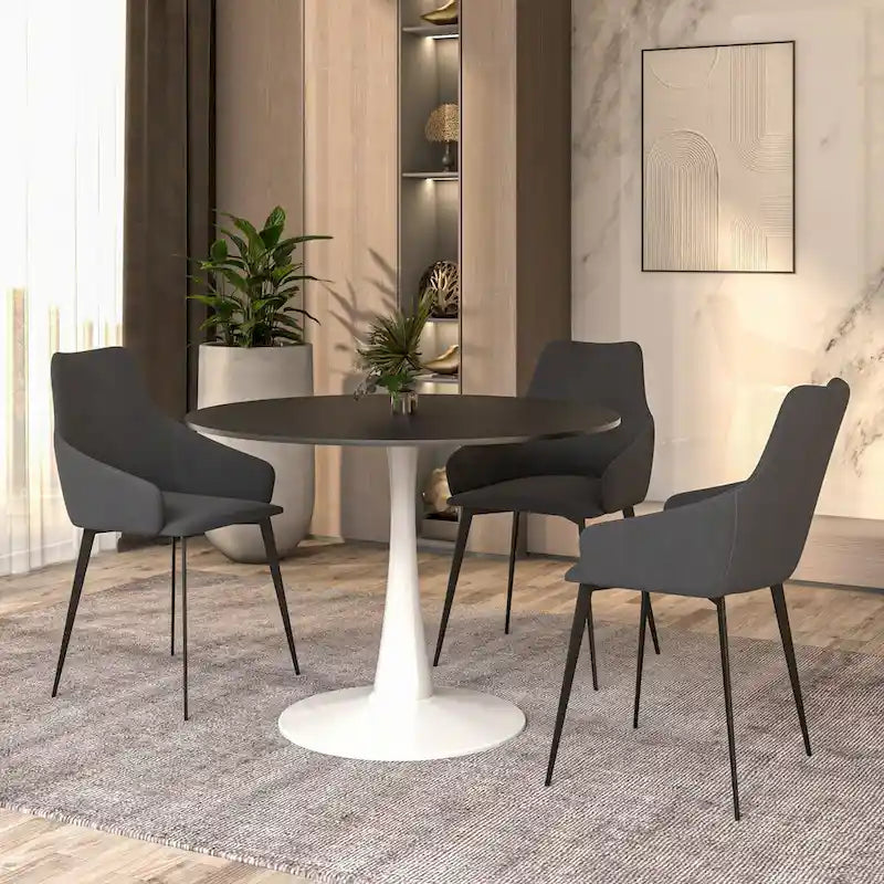 Cette table à manger ronde peut accueillir quatre personnes et dispose d'un plateau en bois MDF et d'une base en acier blanc, la rendant adaptée aux cuisines comme aux salles à manger.